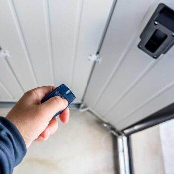 Garage door PVC. Hand use remote controller for closing and open