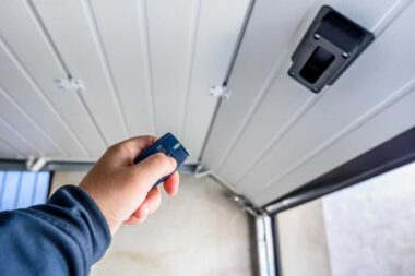 Garage door PVC. Hand use remote controller for closing and open