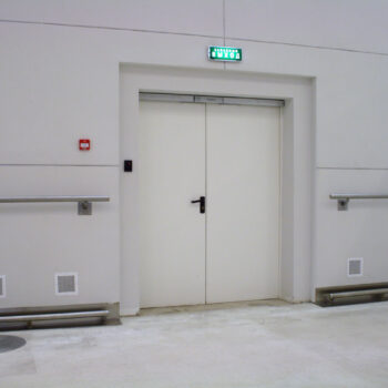 Emergency exit door, white wall, hall, exit.