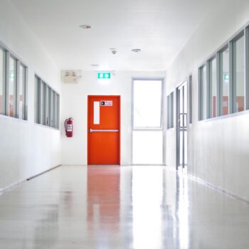 Building Emergency Exit with Exit Sign and Fire Extinguisher